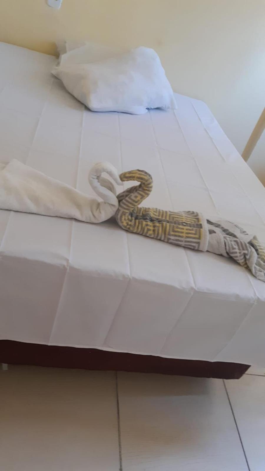 Em Itapua Suites